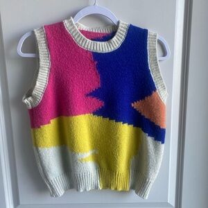 Color block sweater vest. Fits like a small\medium. Vintage inspired. Like new